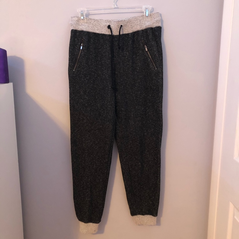 Black and grey  speckled joggers with zip pockets